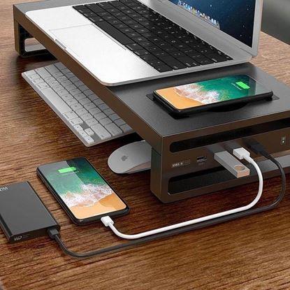 Imaginea Suport metalic pentru monitor cu porturi USB și încărcare wireless.